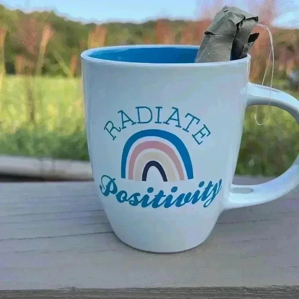 Coffee mug. Radiate positivity. With spoon.
